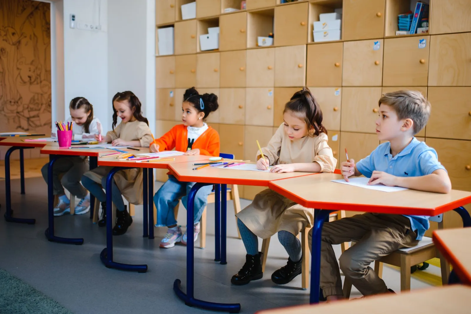 Young children participating in learning activities at preschool.